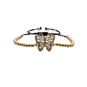 Adjustable gold butterfly charm bracelet with sparkling zircons and black woven cord
