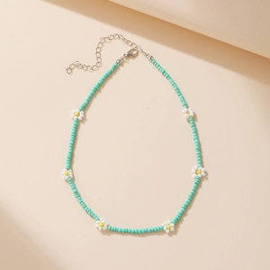 Bohemian mint green seed bead choker with white daisy flowers and silver lobster clasp