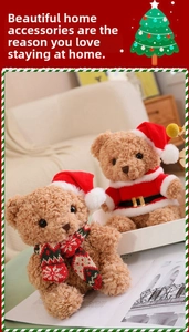 Close-up of plush Christmas teddy bears in festive red Santa outfits and knit scarves