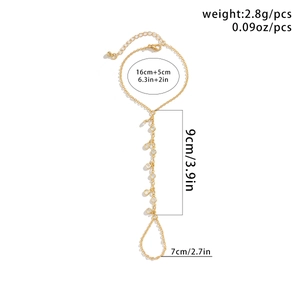 Detailed size chart showing gold slave bracelet dimensions with weight and chain length