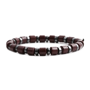 Bracciale di perle di ematite marrone lucido con distanziatori grigio metallizzato