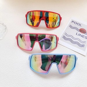 Kids sports cycling sunglasses with wrap-around frames in red, pink, and blue colors