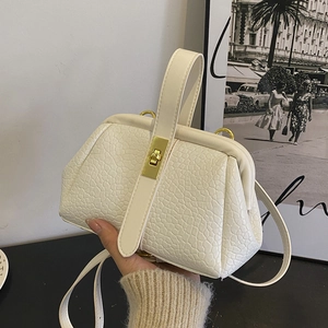 White lychee texture crossbody handbag with vintage metal clasp and top handle