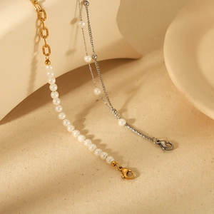 Elegant 18K gold and silver layered pearl bracelets for women with lobster clasp detail