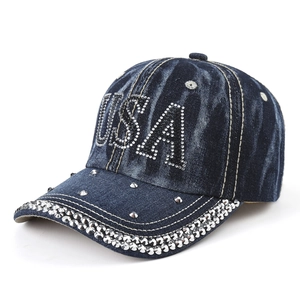 Navy blue washed denim baseball cap with USA rhinestone lettering and studded brim