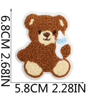Detailed view of brown teddy bear chenille patch with dimensions 6.8x5.8cm on white back
