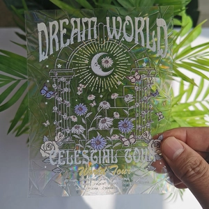 Close-up of holographic PVC suncatcher sticker with moon and floral patterns