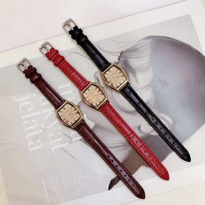 Three square quartz watches with alligator leather straps in brown red and black colors