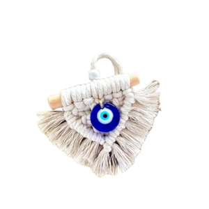 Handmade macrame evil eye wall hanging with white cotton rope and blue glass bead