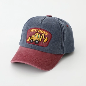 Detail of kids excavator embroidery on blue and burgundy contrast baseball cap