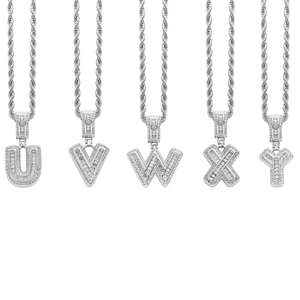 Detail view of silver iced-out alphabet pendants U to Y on rope chains for hip hop style