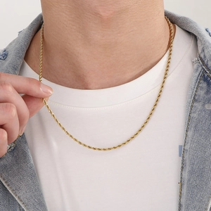 Gold-plated stainless steel twist chain necklace worn by a male model for a trendy hip-hop style