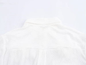 Close-up of the white shirt back collar showing the detailed crinkle texture and seams