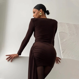 Detail of dark brown bodycon dress showing back ruching and slim fit silhouette