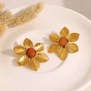 French vintage style 18K gold plated flower earrings with red natural stone in a white tray