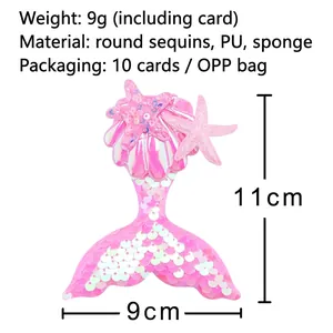 Sparkly pink mermaid tail hair clip with colorful sequins and shell star details
