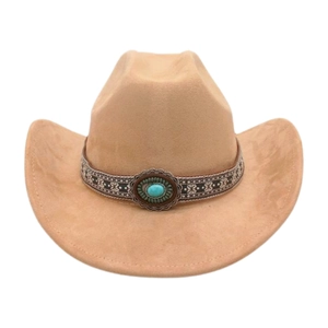 Detail of western cowboy hat with ethnic embroidery band and turquoise stone ornament