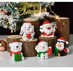 Set of 5 resin Christmas figurines including Santa and animals on wooden base