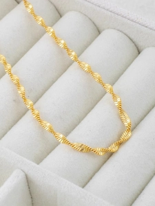 Minimalist gold stainless steel sparkling wave chain necklace in white jewelry box