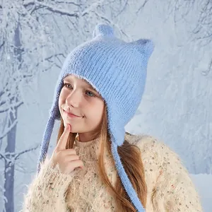 Kids winter blue knit beanie with cat ears and earflaps for cold weather warmth