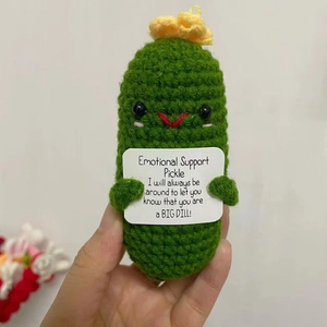 Handmade crochet emotional support pickle doll with cute yellow flower and motivational card