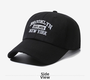 Detail view of the Brooklyn 1631 3D embroidery on this black cotton twill baseball cap