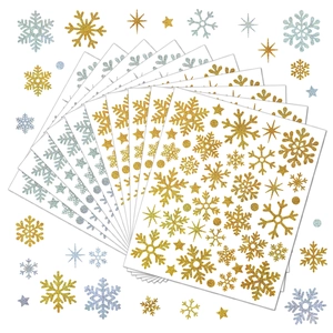 Glittering gold and silver Christmas snowflake stickers set for festive holiday DIY decoration
