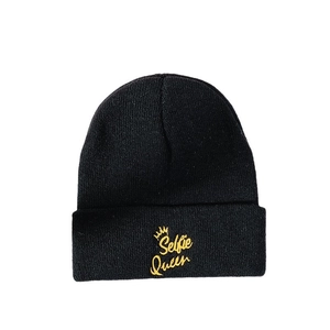 Classic black cuffed beanie with yellow Selfie Queen embroidery and crown detail