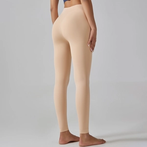 Rear view of high-waisted seamless thermal leggings showing body-shaping effect