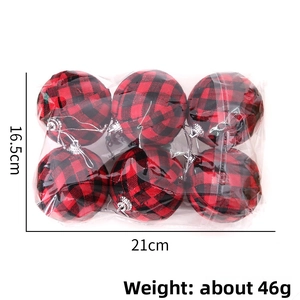 Close-up of 6pcs red and black buffalo plaid Christmas ball ornaments in clear packaging