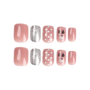 Christmas press-on nails set with pink glitter, white dots and cute reindeer patterns