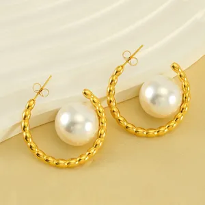 Elegant 18k gold-plated C-shaped hoop earrings with large white pearl insets