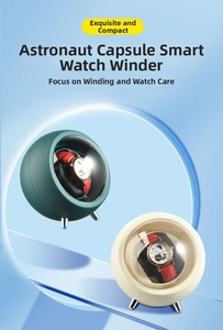 Dual automatic watch winders with spaceship design and polished silver support feet