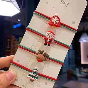 Set of 4 cute Christmas hair ties with Santa Claus, reindeer, and tree figurines