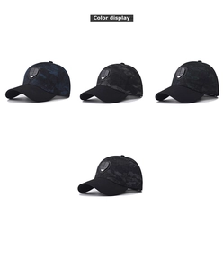 Detail view showing four camouflage baseball caps with 3D shield badges in various colors