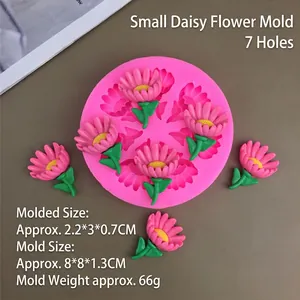7-cavity silicone daisy flower mold with pink and yellow floral craft samples