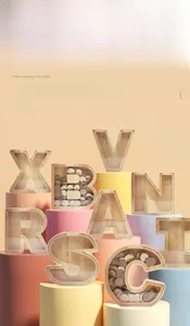 Detail of wooden letter piggy bank with transparent acrylic panel and metal screw fixing