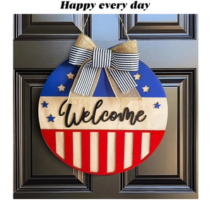 Detail of multi-layer wood Welcome sign with patriotic bow and American flag motifs