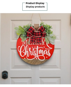 Close-up of a rustic Merry Christmas wooden wreath with red buffalo plaid bow and greenery