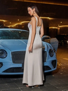 Elegant sleeveless champagne satin evening gown with sequin bodice and slim fit design
