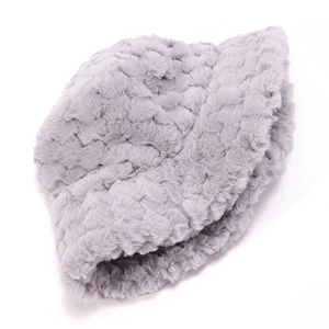 Close-up of the thick grey plush fabric texture and soft winter bucket hat material