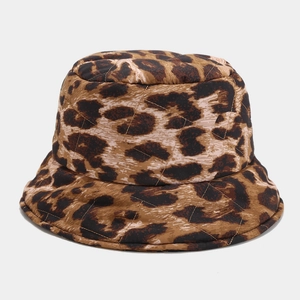 Macro detail of leopard print bucket hat with quilted diamond stitching and textured fabric
