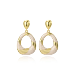 Macro detail of oval enamel drop earrings with gold textured thread and marble finish