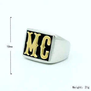 Punk style wide titanium steel signet ring with gold MC letters and black background