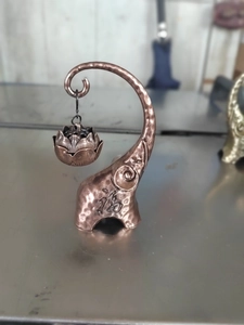 Detail of bronze elephant incense burner with hanging lotus holder and fu character engraving