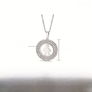 Detail of hollow figure pendant with rhinestones and 34mm stainless steel chain