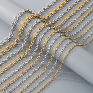 Detail view of O-chain necklace in gold and silver finishes with various thicknesses