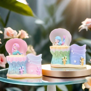 Resin mermaid shell pen holder and desk organizer in pastel pink and blue gradient