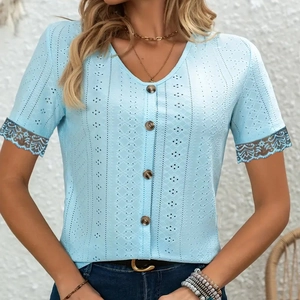 Light blue V-neck top with hollow embroidery, dark buttons and delicate lace sleeves
