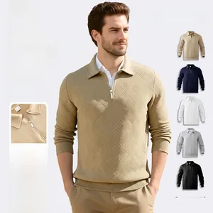 Detail of men's quarter-zip jacquard sweater showing collar, ribbed cuffs and color options